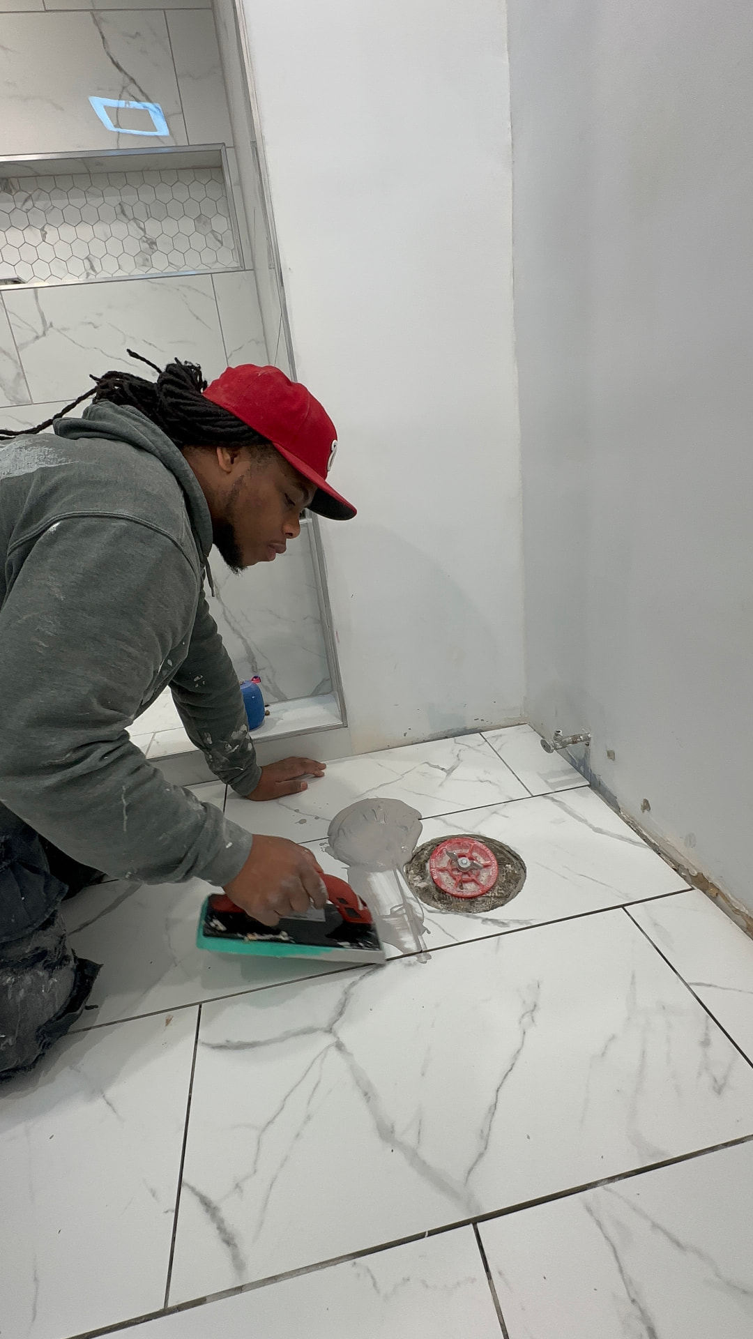 Creativeminds Construction contractor reviewing project plans on an Indianapolis job site
